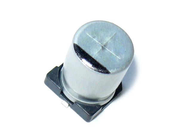 картинка SMD электролитический конденсатор 22uF 25V 5X5 | ВсеКомпоненты.ру